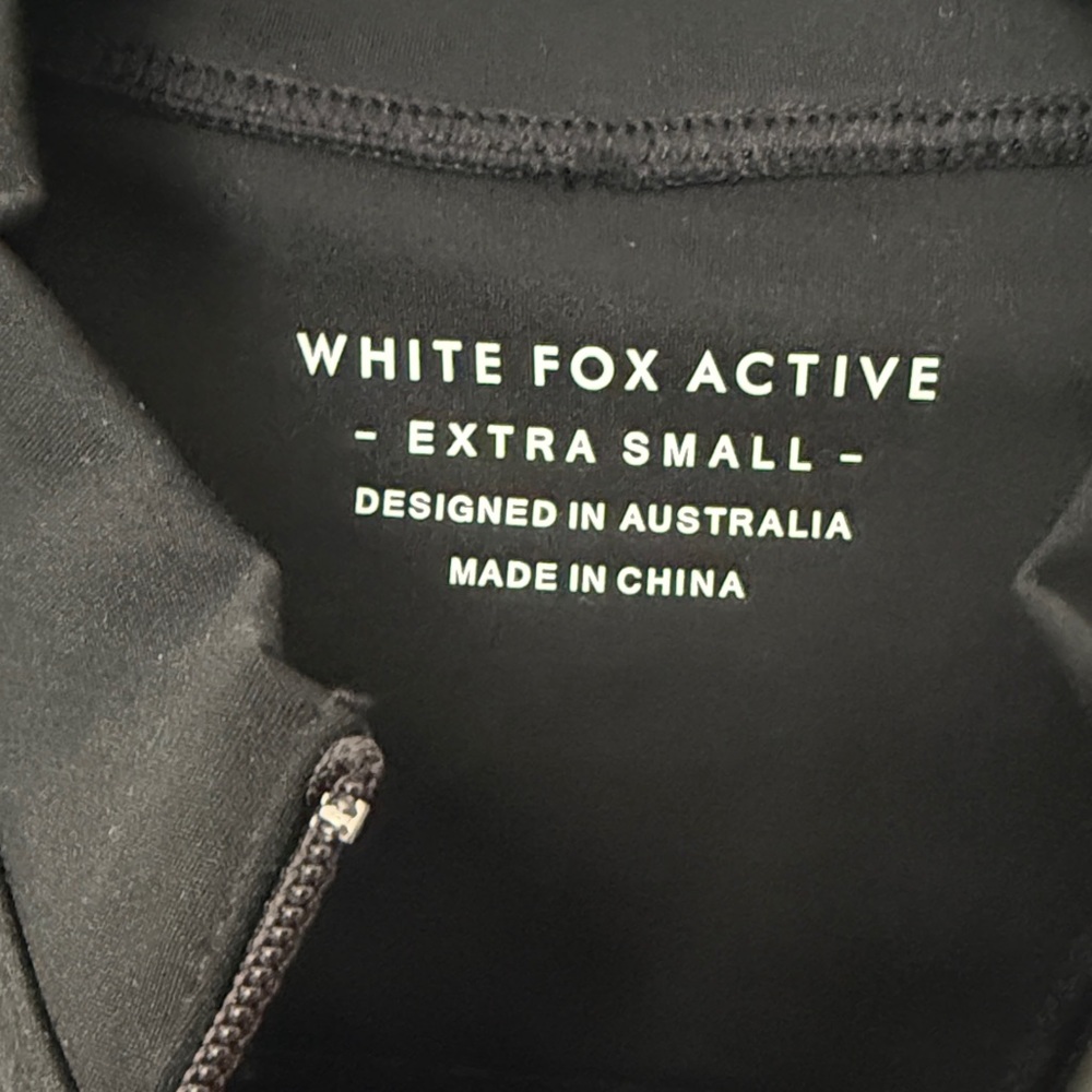 White Fox Boutique Black Sleeveless Zip-Front Jumpsuit Romper - Picture 3 of 5